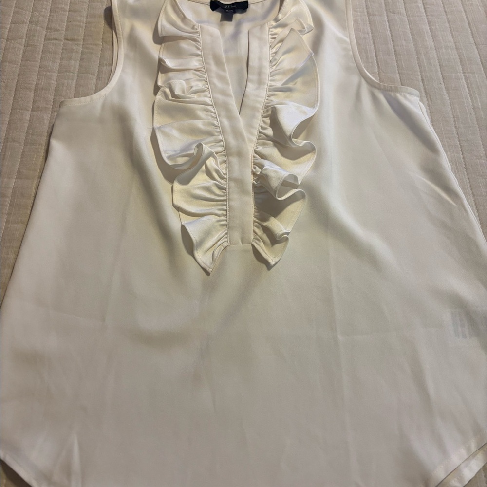 J Crew XXS cream color ruffled blouse.
